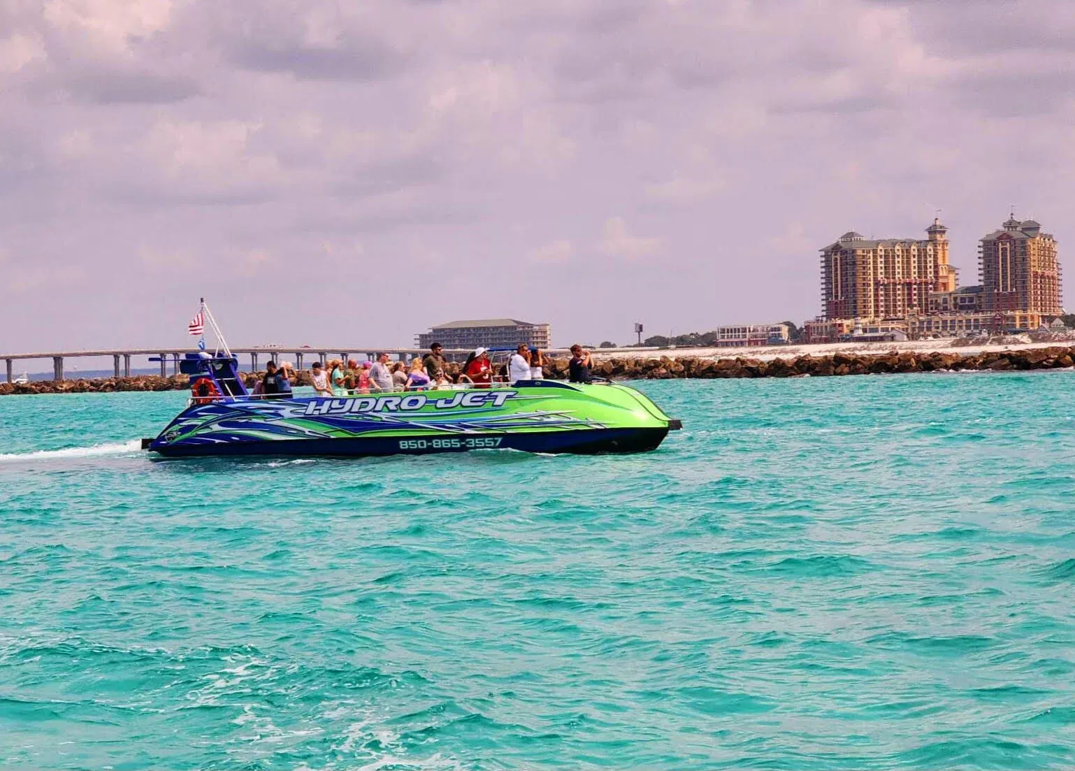 HydroJet cruising past Destin skyline
